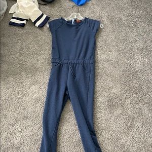 A long panted navy blue romper in great condition